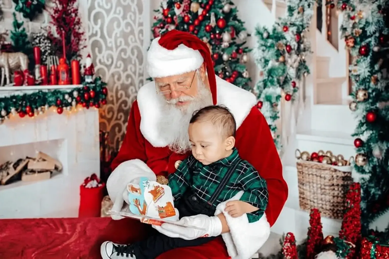 Santa Skip reading a Christmas story with a young child