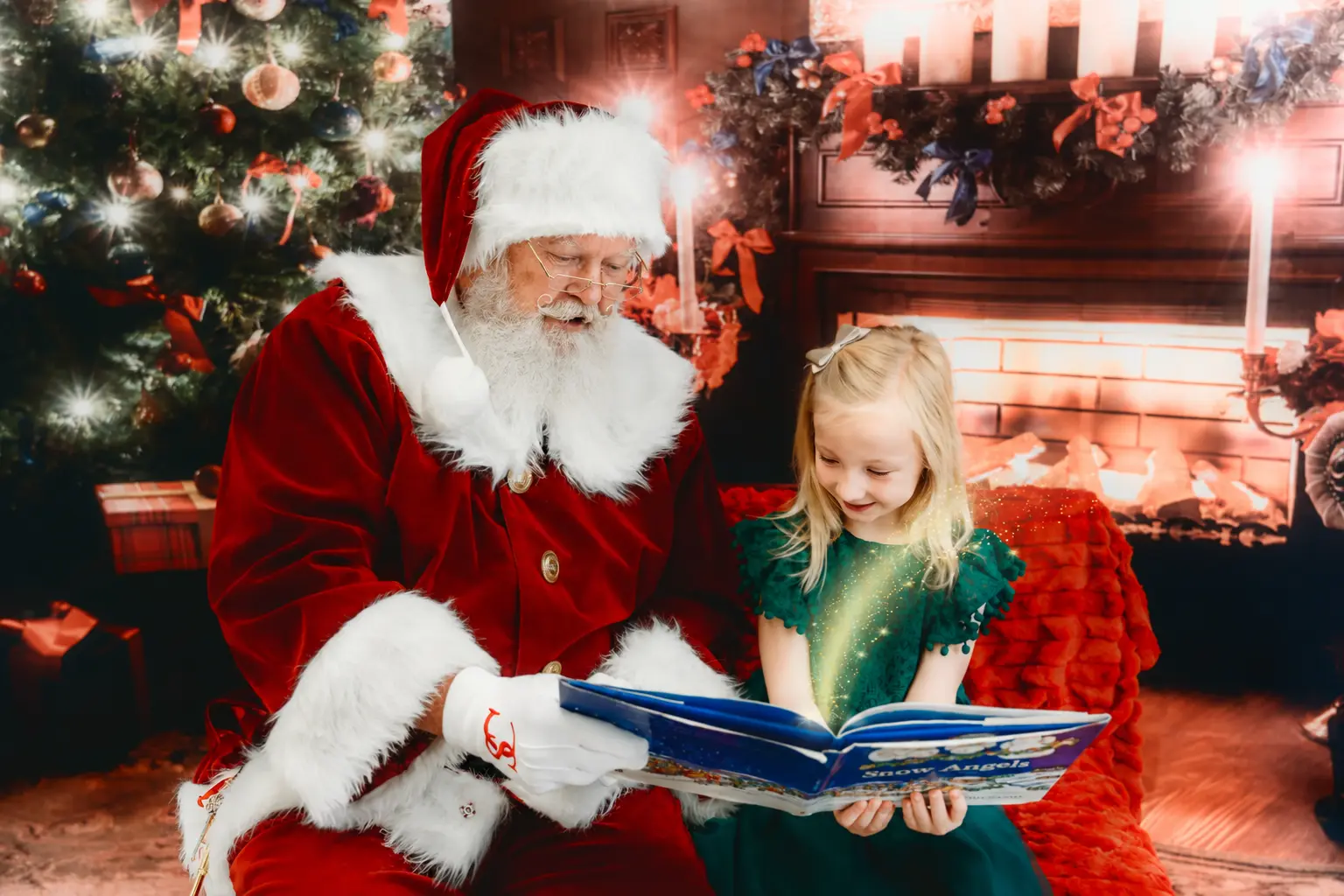 Santa Skip reading a Christmas story beside a fireplace